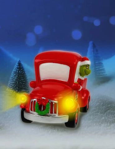 Accesorio Navideño Grinch Iluminado en Camión Rojo – Pueblo Navideño